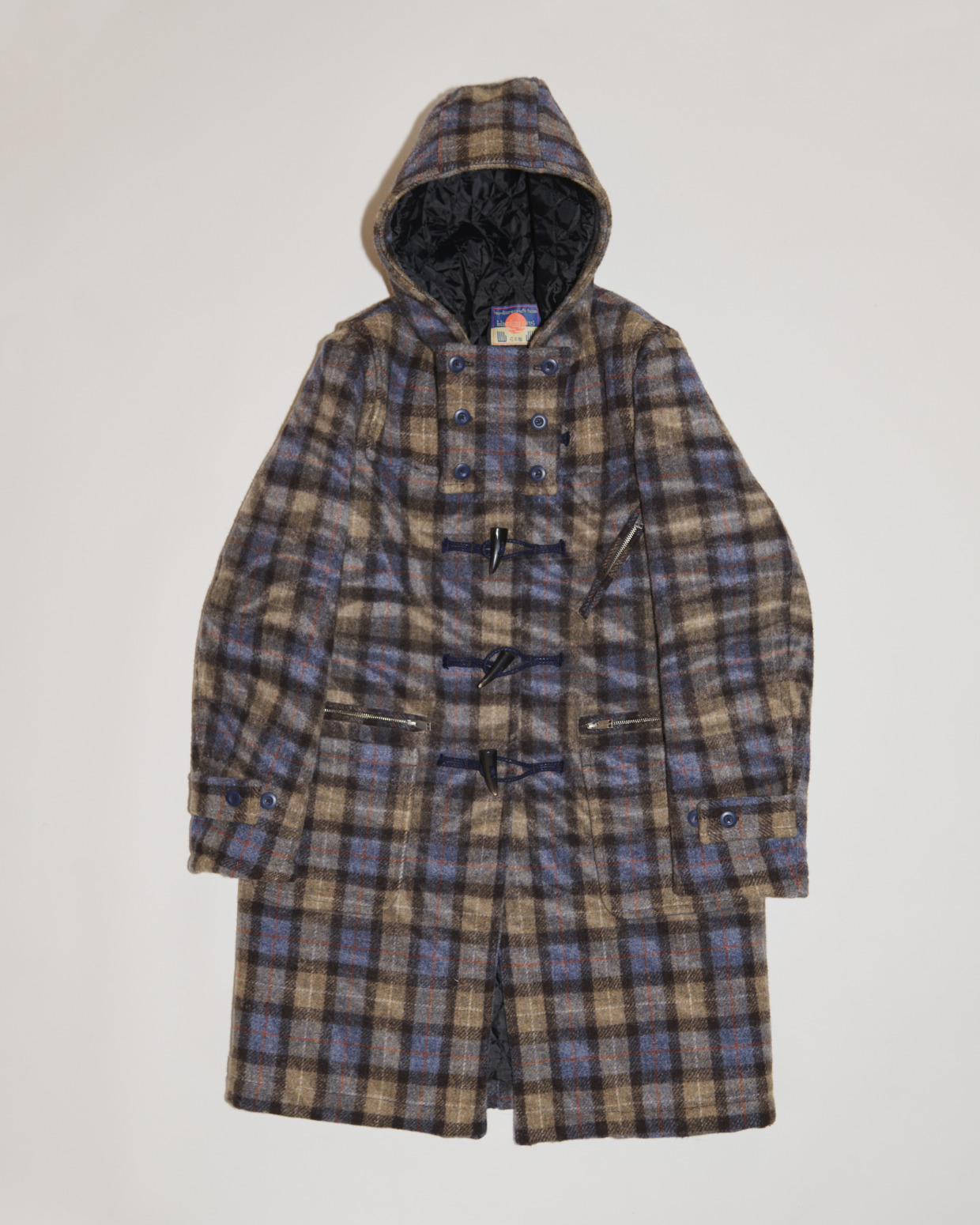 945-81TJ464-1 A duffle coat made by needle-punching Harris tweed and faux zebra fur together